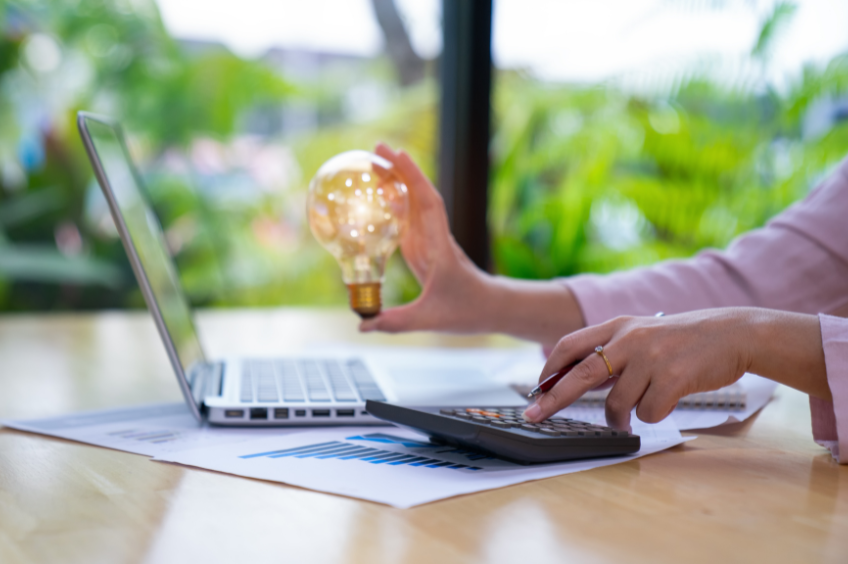 Zoomed in image of woman's hands. The right is holding a 
